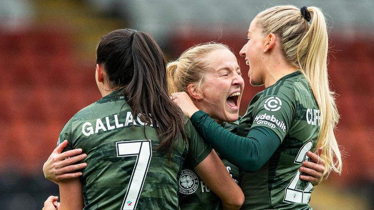 AIRDRIE, SCOTLAND - SEPTEMBER 22: Celtic's Murphy Agnew (C) celebrates with Amy Gallacher (L) and Lucy Ashworth-Clifford after (R) scoring to make it 1-0 during a UEFA Women's Champions League Qualifying First Leg match between Vorskla Poltava and Celtic, at the Albert Bartlett Stadium, on September 22, 2024, in Airdrie, Scotland. (Photo by Ewan Bootman / SNS Group)