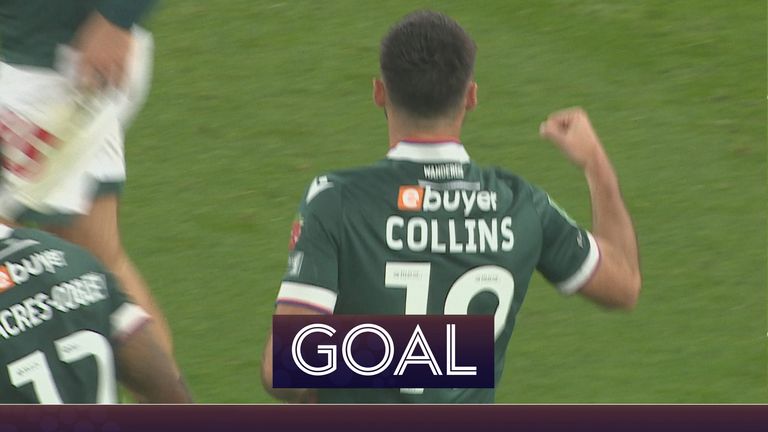 Collins scores for Bolton in their Carabao Cup tie against Arsenal.