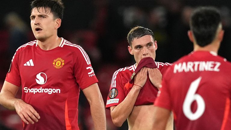 Harry Maguire, Manuel Ugarte and Lisandro Martinez look on after Man Utd's 1-1 draw against FC Twente in the Europa League 