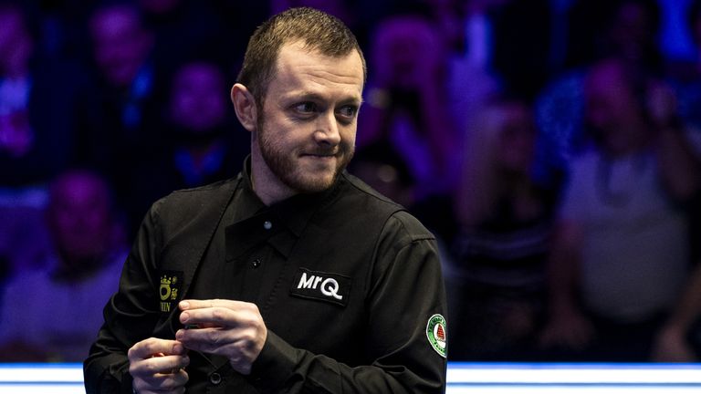 Mark Allen before potting the black and making a 147 in his quarter final match against Mark Selby (not in picture) during day six of the MrQ Masters at Alexandra Palace, London. Picture date: Friday January 12, 2024.